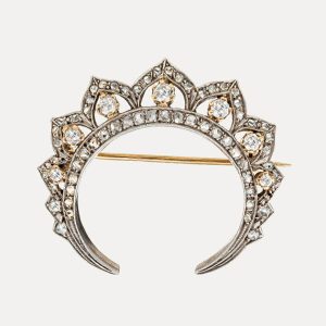Antiga Pregadeira "Crescente" em prata e ouro com diamantes