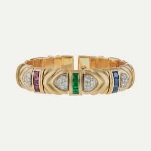 Rigid bracelet in gold, sapphires, emeralds, rubies and diamonds