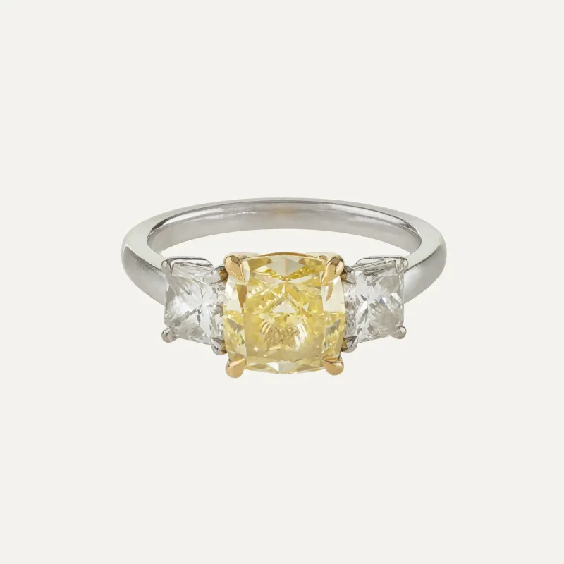 White gold ring with a 2.07 ct Fancy Intense Yellow diamond.