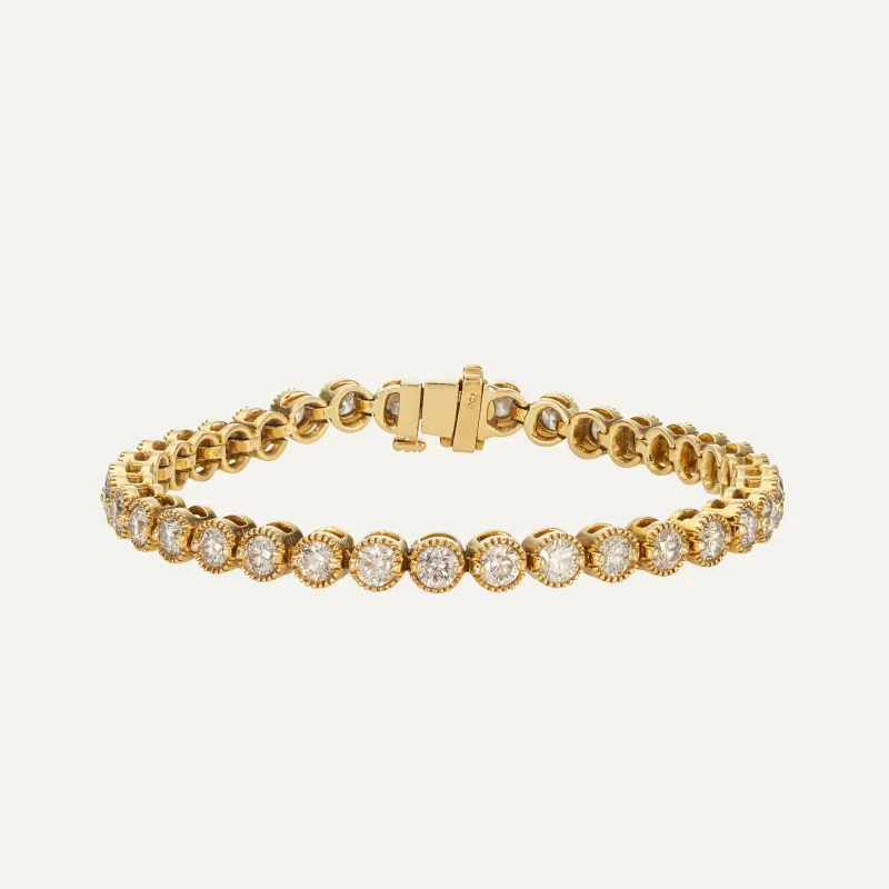 18k yellow gold riviera bracelet with approximately 6 ct of diamonds.