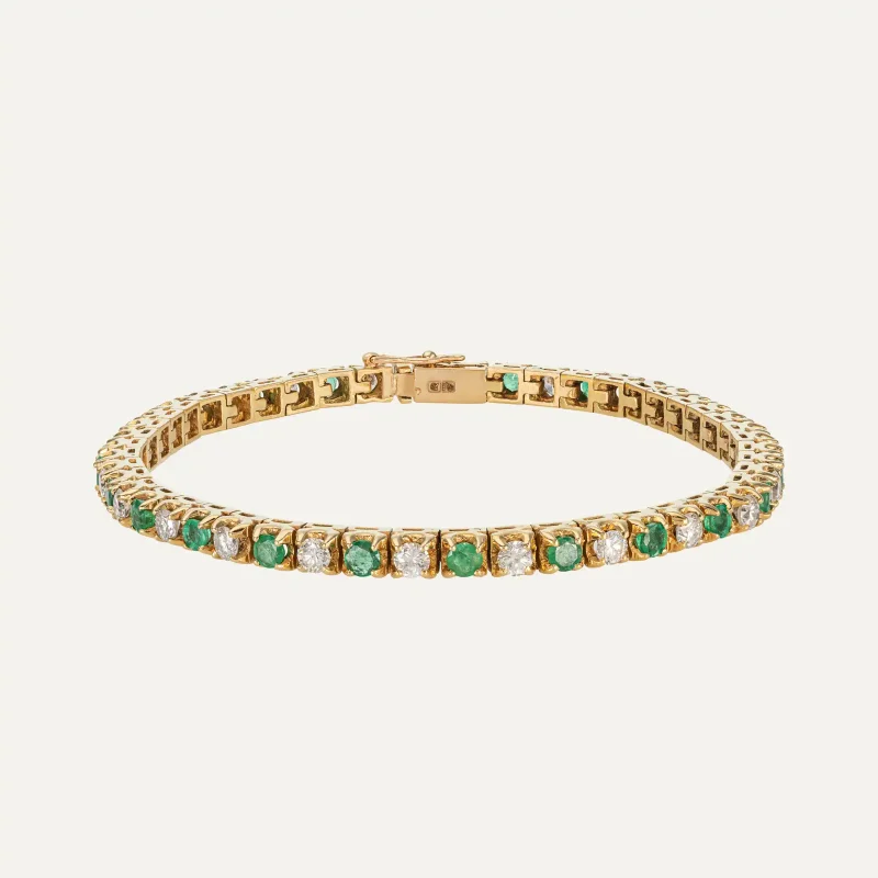 Pulseira em ouro amarelo 19,2 kt com esmeraldas naturais e diamantes intercalados
